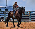Holly Austin jousting at the Larimer County Fair